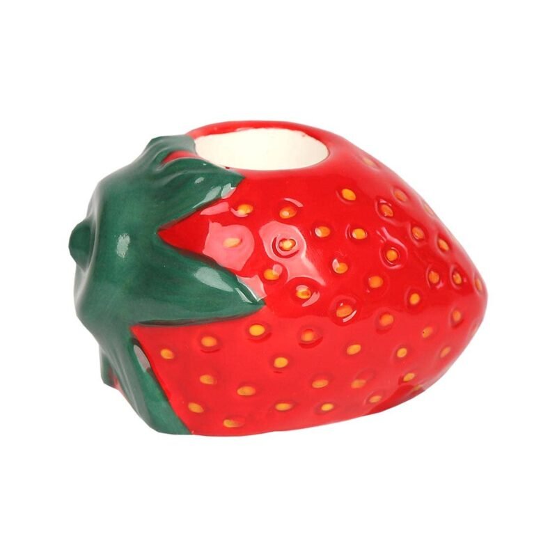Crafted from ceramic and shaped like a juicy red strawberry